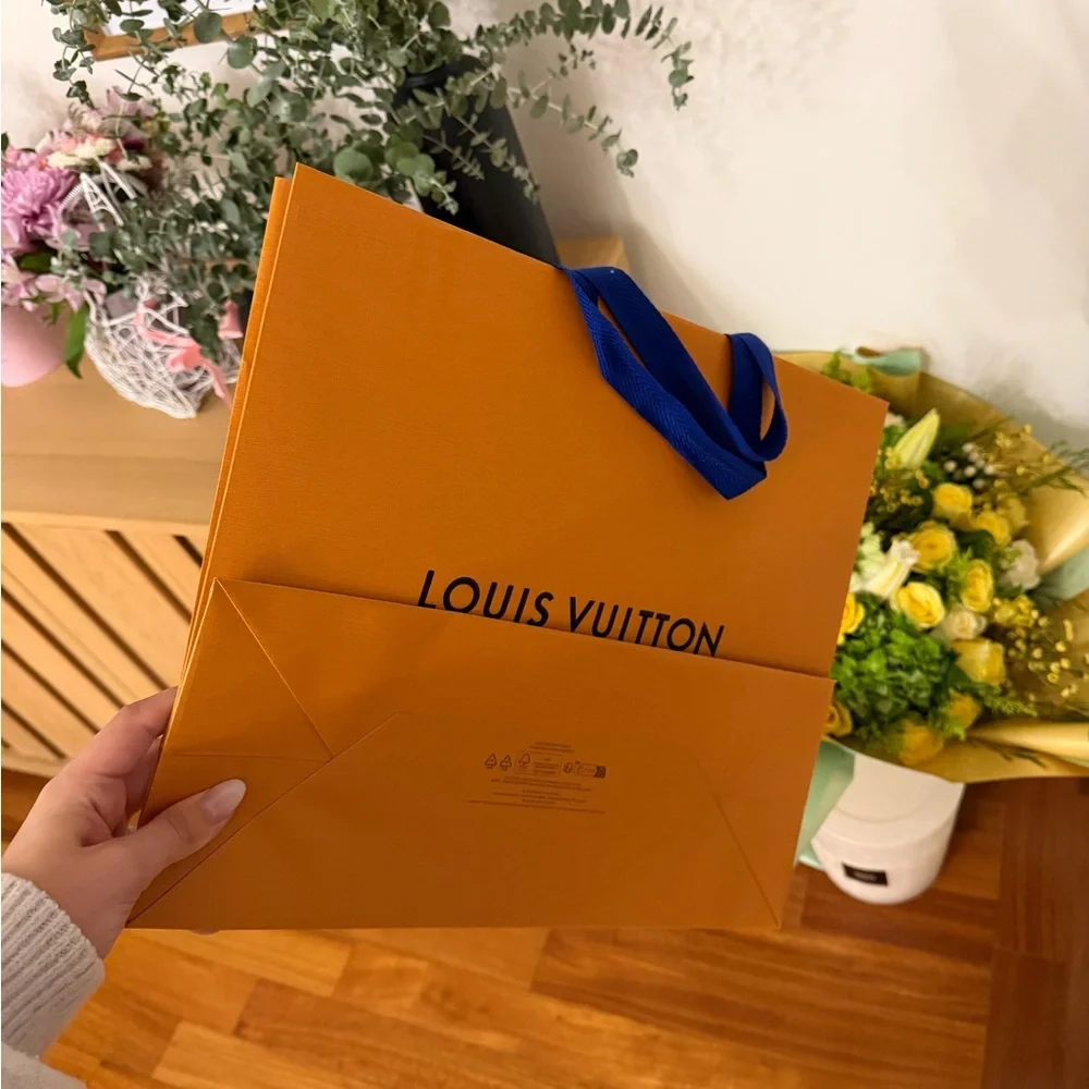 Louis Vuitton Orange Branded Shopping Bag with Black Logo
